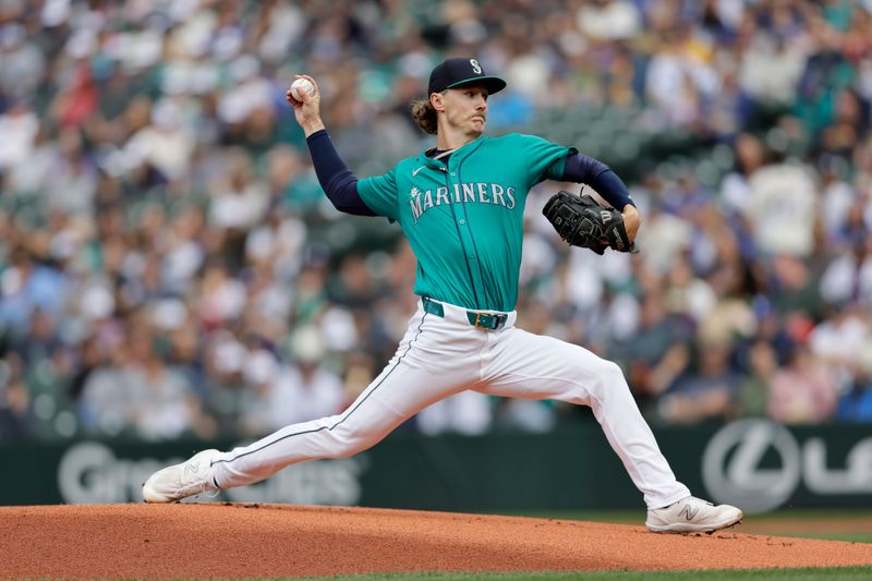 Jun 1, 2024; Seattle, Washington, USA;  Seattle Mariners starting pitcher Bryce Miller (50) throws against the Los Angeles Angels during the first inning at T-Mobile Park. Mandatory Credit: John Froschauer-USA TODAY Sports