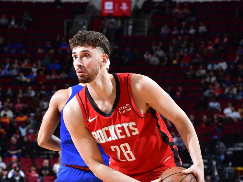 HOUSTON, TX - FEBRUARY 1: Alperen Sengun #28 of the Houston Rockets looks to pass the ball during the game against the New York Knicks on February 1, 2024 at the Toyota Center in Houston, Texas. NOTE TO USER: User expressly acknowledges and agrees that, by downloading and or using this photograph, User is consenting to the terms and conditions of the Getty Images License Agreement. Mandatory Copyright Notice: Copyright 2024 NBAE (Photo by Logan Riely/NBAE via Getty Images)