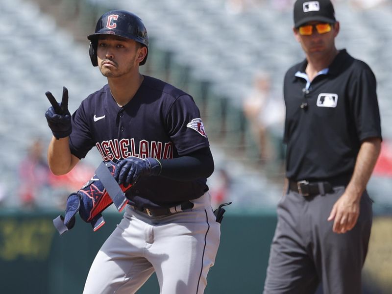 Sep 10, 2023; Anaheim, California, USA; Cleveland Guardians left fielder Steven Kwan (38) gestures after hitting a double during the fifth inning against the Los Angeles Angels at Angel Stadium. Mandatory Credit: Jessica Alcheh-USA TODAY Sports