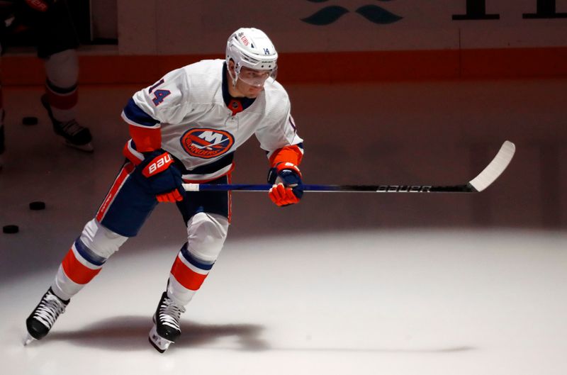 Feb 20, 2024; Pittsburgh, Pennsylvania, USA; New York Islanders center Bo Horvat (14) takes the ice to warm up before the game against the Pittsburgh Penguins at PPG Paints Arena. Mandatory Credit: Charles LeClaire-USA TODAY Sports