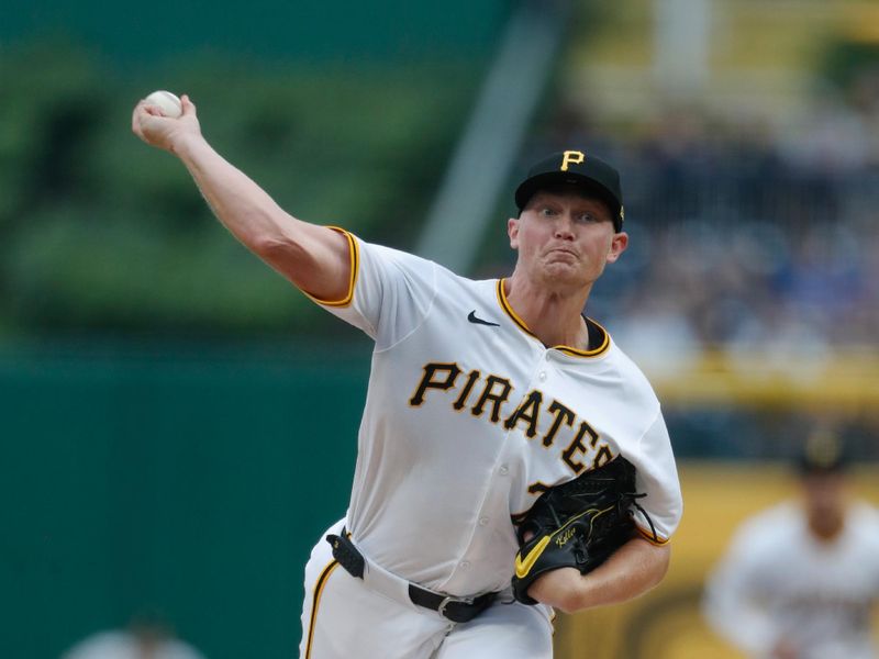 Jul 22, 2024; Pittsburgh, Pennsylvania, USA;  Pittsburgh Pirates starting pitcher Mitch Keller (23) delivers a pitch against the St. Louis Cardinals during the first inning at PNC Park. Mandatory Credit: Charles LeClaire-USA TODAY Sports