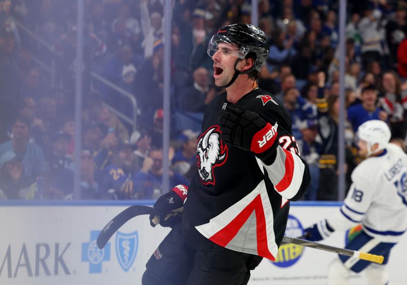Oct 24, 2025; Buffalo, New York, USA;  Buffalo Sabres defenseman Mattias Samuelsson (23) reacts after scoring his second goal of the game during the second period against the Toronto Maple Leafs at KeyBank Center. Mandatory Credit: Timothy T. Ludwig-Imagn Images