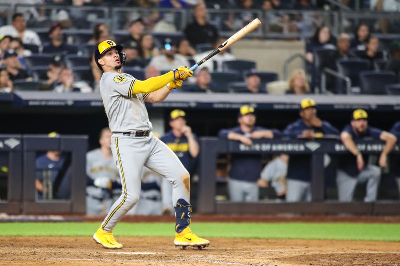 Sep 8, 2023; Bronx, New York, USA;  Milwaukee Brewers shortstop Willy Adames (27) hits an RBI double in the seventh inning against the New York Yankees at Yankee Stadium. Mandatory Credit: Wendell Cruz-USA TODAY Sports