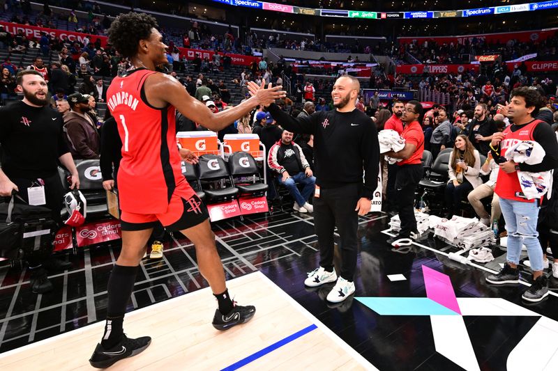 LOS ANGELES, CA - APIRL 14: Amen Thompson #1 of the Houston Rockets high fives after the game against the LA Clippers on April 14, 2024 at Crypto.Com Arena in Los Angeles, California. NOTE TO USER: User expressly acknowledges and agrees that, by downloading and/or using this Photograph, user is consenting to the terms and conditions of the Getty Images License Agreement. Mandatory Copyright Notice: Copyright 2024 NBAE (Photo by Adam Pantozzi/NBAE via Getty Images)