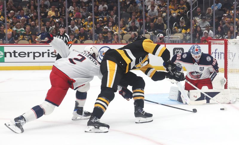 Sep 27, 2025; Pittsburgh, Pennsylvania, USA;  Columbus Blue Jackets goaltender Elvis Merzlikins (90) makes a save against Pittsburgh Penguins right wing Anthony Mantha (middle) as defenseman Jake Christiansen (2) defends during the first period at PPG Paints Arena. Mandatory Credit: Charles LeClaire-Imagn Images