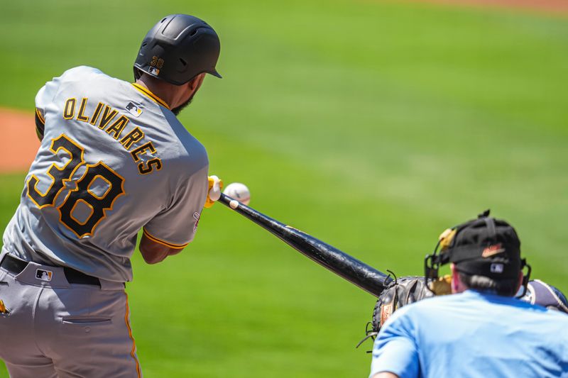 Jun 30, 2024; Cumberland, Georgia, USA; Pittsburgh Pirates right fielder Edward Olivares (38) singles against the Atlanta Braves during the first inning at Truist Park. Mandatory Credit: Dale Zanine-USA TODAY Sports