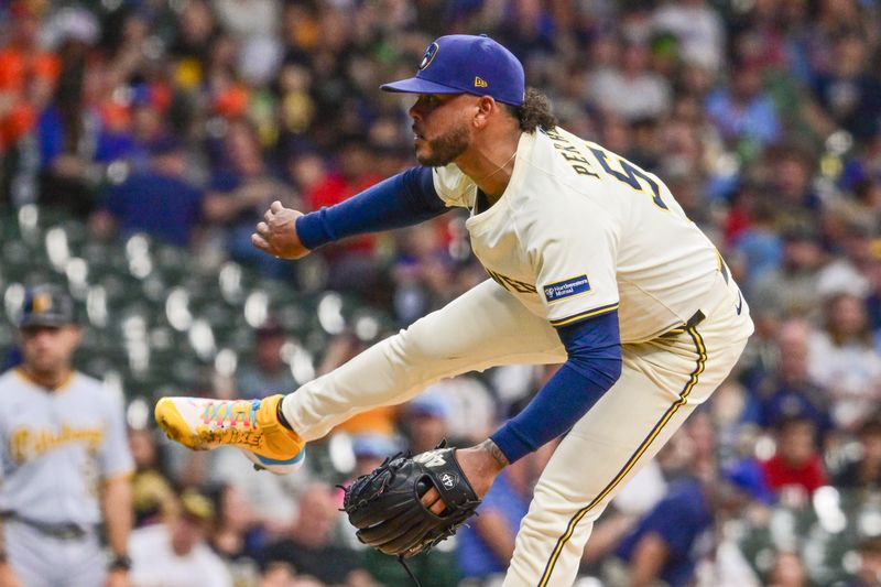 Jun 24, 2025; Milwaukee, Wisconsin, USA; Milwaukee Brewers starting pitcher Freddy Peralta (51) throws a pitch in the first inning against the Pittsburgh Pirates at American Family Field. Mandatory Credit: Benny Sieu-Imagn Images