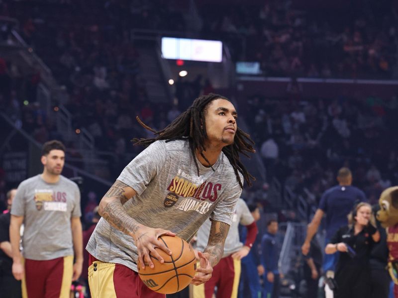 CLEVELAND, OH - March 8:  Emoni Bates #21 of the Cleveland Cavaliers warms up before the game against the Minnesota Timberwolves on March 8, 2024 at Rocket Mortgage FieldHouse in Cleveland, Ohio. NOTE TO USER: User expressly acknowledges and agrees that, by downloading and/or using this Photograph, user is consenting to the terms and conditions of the Getty Images License Agreement. Mandatory Copyright Notice: Copyright 2024 NBAE (Photo by Lauren Leigh Bacho/NBAE via Getty Images)