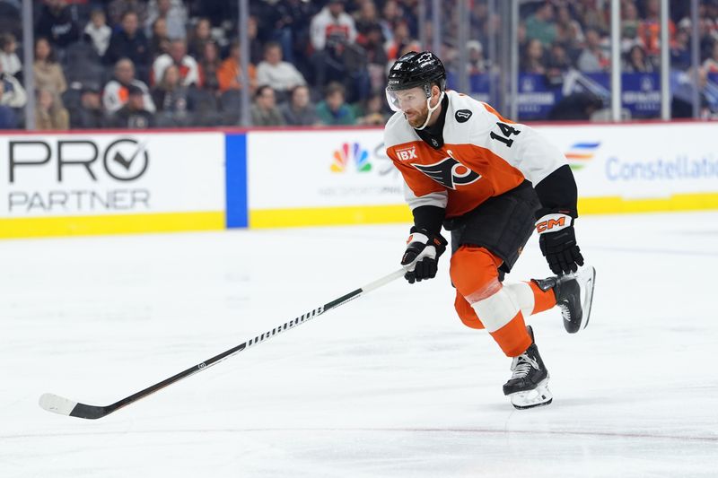 Mar 14, 2026; Philadelphia, Pennsylvania, USA; Philadelphia Flyers center Sean Couturier (14) in action against the Columbus Blue Jackets in the first period at Xfinity Mobile Arena. Mandatory Credit: Kyle Ross-Imagn Images