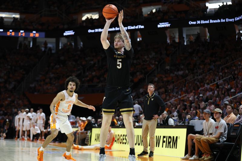 Mar 7, 2026; Knoxville, Tennessee, USA;  Vanderbilt Commodores forward Tyler Nickel (5) shoots a three pointer against the Tennessee Volunteers during the second half at Thompson-Boling Arena at Food City Center. Mandatory Credit: Randy Sartin-Imagn Images