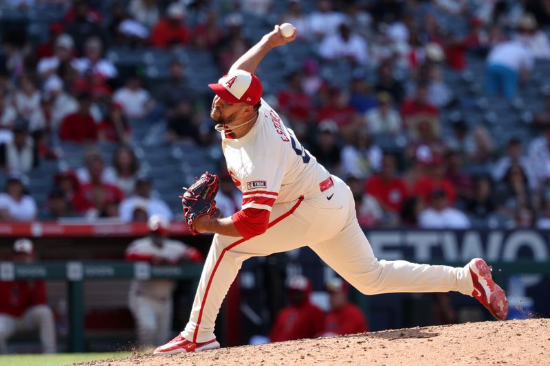 Jun 9, 2024; Anaheim, California, USA;  Los Angeles Angels relief pitcher Carlos Estevez (53) pitches during the ninth inning against the Houston Astros at Angel Stadium. Mandatory Credit: Kiyoshi Mio-USA TODAY Sports