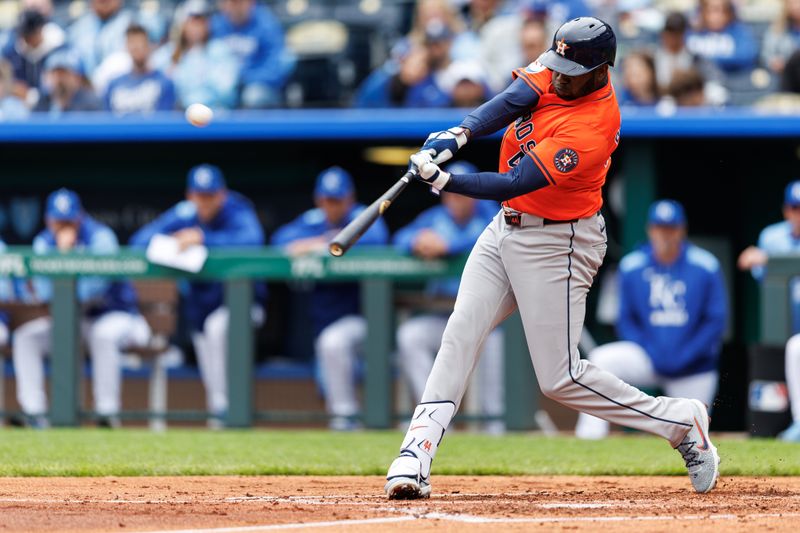 Apr 27, 2025; Kansas City, Missouri, USA; Houston Astros outfielder Yordan Alvarez (44) hits a home run during the third inning against the Kansas City Royals at Kauffman Stadium. Mandatory Credit: William Purnell-Imagn Images