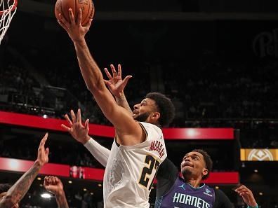 CHARLOTTE, NC - DECEMBER 23: Jamal Murray #27 of the Denver Nuggets shoots the ball during the game against the Charlotte Hornets on December 23, 2023 at Spectrum Center in Charlotte, North Carolina. NOTE TO USER: User expressly acknowledges and agrees that, by downloading and or using this photograph, User is consenting to the terms and conditions of the Getty Images License Agreement. Mandatory Copyright Notice: Copyright 2023 NBAE (Photo by Kent Smith/NBAE via Getty Images)