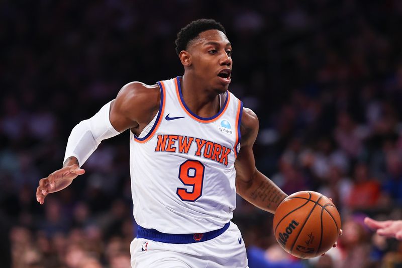 NEW YORK, NEW YORK - DECEMBER 25:  RJ Barrett #9 of the New York Knicks dribbles upcourt during the first quarter of the game against the Milwaukee Bucks at Madison Square Garden on December 25, 2023 in New York City.  NOTE TO USER: User expressly acknowledges and agrees that, by downloading and or using this photograph, User is consenting to the terms and conditions of the Getty Images License Agreement. (Photo by Rich Graessle/Getty Images)