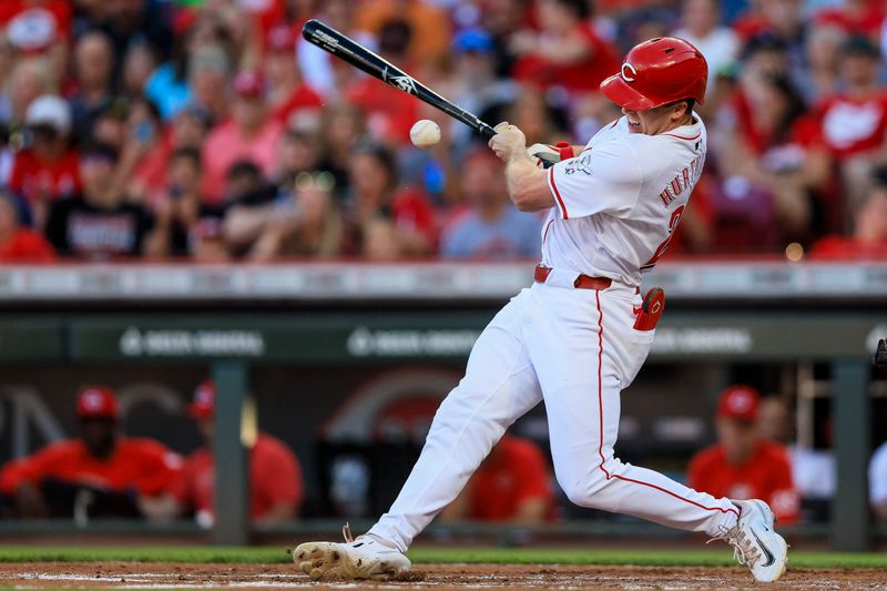 Jun 12, 2024; Cincinnati, Ohio, USA; Cincinnati Reds outfielder Jacob Hurtubise (26) breaks his bat on a hit in the second inning against the Cleveland Guardians at Great American Ball Park. Mandatory Credit: Katie Stratman-USA TODAY Sports