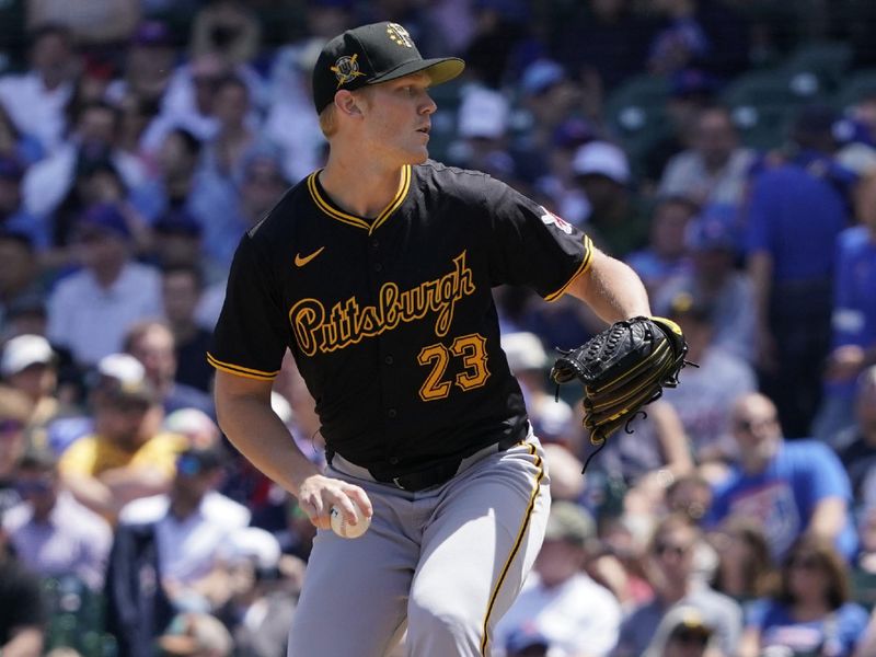 May 19, 2024; Chicago, Illinois, USA; Pittsburgh Pirates pitcher Mitch Keller (23) throws the ball against the Chicago Cubs during the first inning at Wrigley Field. Mandatory Credit: David Banks-USA TODAY Sports