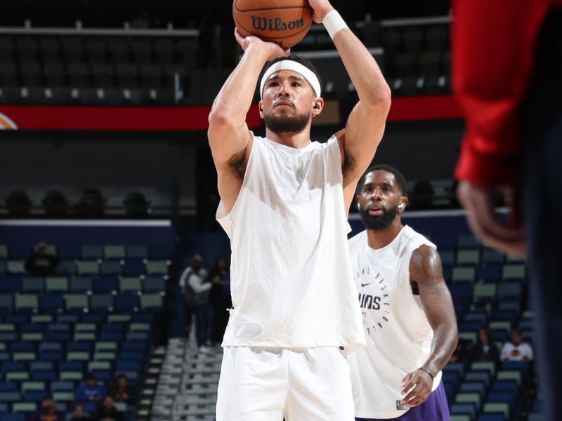 NEW ORLEANS, LA - DECEMBER 5: Devin Booker #1 of the Phoenix Suns warms up before the game against the New Orleans Pelicans on December 5, 2024 at the Smoothie King Center in New Orleans, Louisiana. NOTE TO USER: User expressly acknowledges and agrees that, by downloading and or using this Photograph, user is consenting to the terms and conditions of the Getty Images License Agreement. Mandatory Copyright Notice: Copyright 2024 NBAE (Photo by Layne Murdoch Jr./NBAE via Getty Images)