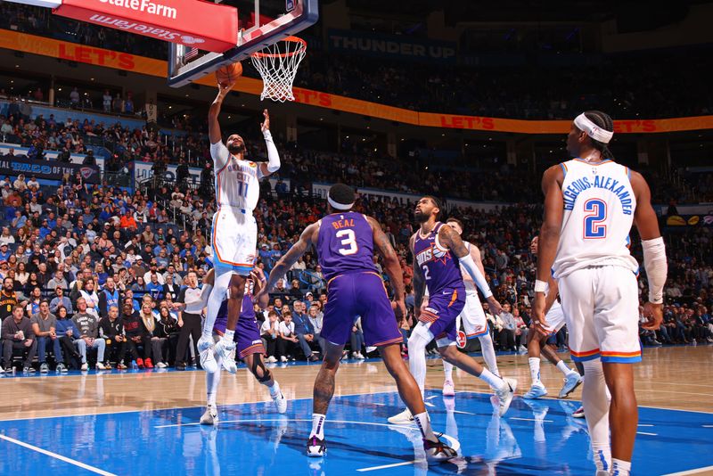 OKLAHOMA CITY, OK - FEBRUARY 5: Isaiah Joe #11 of the Oklahoma City Thunder shoots the ball during the game against the Phoenix Suns on February 5, 2025 at Paycom Center in Oklahoma City, Oklahoma. NOTE TO USER: User expressly acknowledges and agrees that, by downloading and or using this photograph, User is consenting to the terms and conditions of the Getty Images License Agreement. Mandatory Copyright Notice: Copyright 2025 NBAE (Photo by Zach Beeker/NBAE via Getty Images)