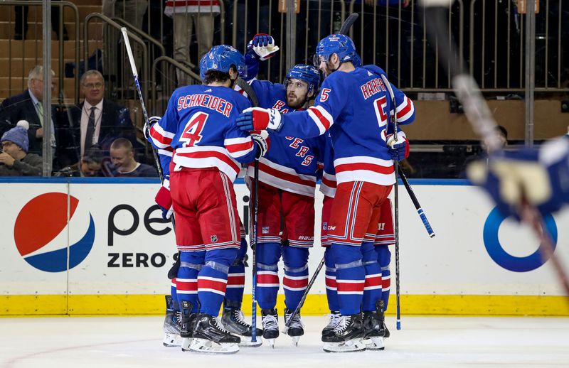 Apr 5, 2023; New York, New York, USA; New York Rangers center Tyler Motte (14) celebrates his goal against the Tampa Bay Lightning during the first period at Madison Square Garden. Mandatory Credit: Danny Wild-USA TODAY Sports