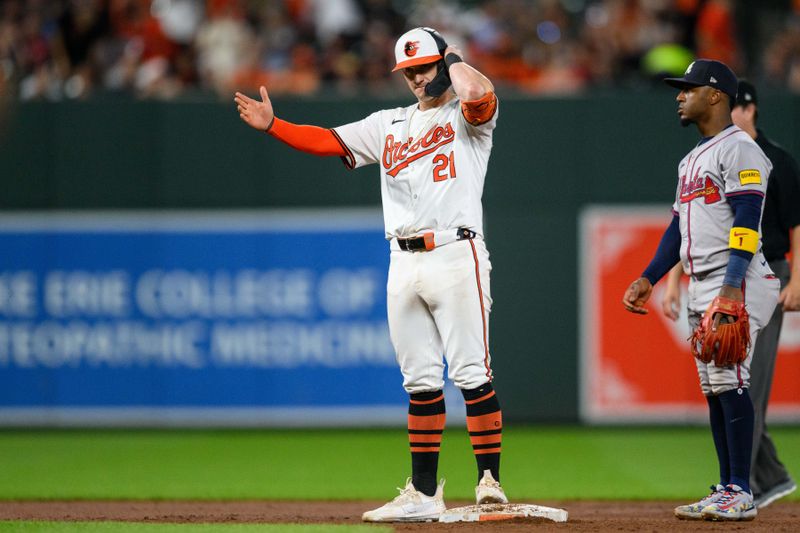 Jun 12, 2024; Baltimore, Maryland, USA; Baltimore Orioles outfielder Austin Hays (21) reacts after hitting a double during the eighth inning against the Atlanta Braves at Oriole Park at Camden Yards. Mandatory Credit: Reggie Hildred-USA TODAY Sports