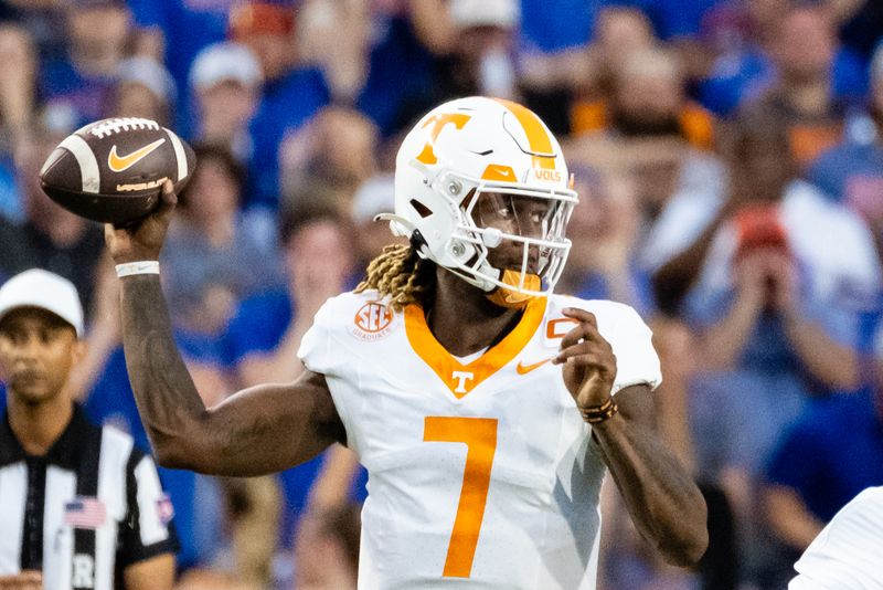 Sep 16, 2023; Gainesville, Florida, USA; Tennessee Volunteers quarterback Joe Milton III (7) drops back to pass during the first half between the Florida Gators and Tennessee Volunteers at Ben Hill Griffin Stadium. Mandatory Credit: Chris Watkins-USA TODAY Sports