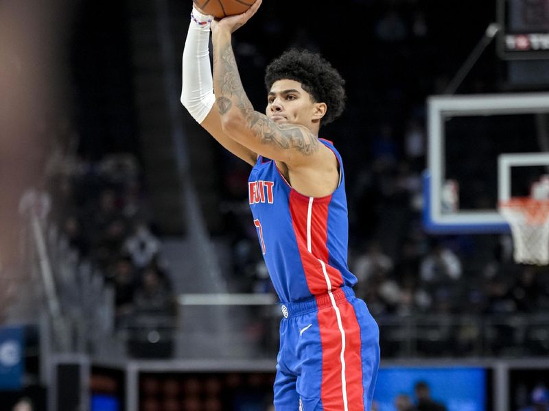 DETROIT, MICHIGAN - DECEMBER 06: Killian Hayes #7 of the Detroit Pistons shoots the ball against the Memphis Grizzlies during the first quarter at Little Caesars Arena on December 06, 2023 in Detroit, Michigan. NOTE TO USER: User expressly acknowledges and agrees that, by downloading and or using this photograph, User is consenting to the terms and conditions of the Getty Images License Agreement. (Photo by Nic Antaya/Getty Images)