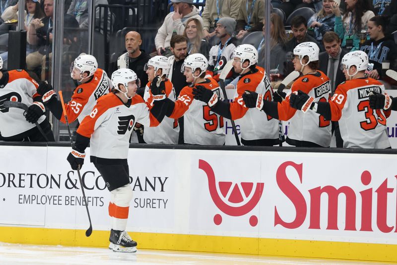 Jan 21, 2026; Salt Lake City, Utah, USA; The Philadelphia Flyers celebrate a goal by defenseman Cam York (8) during the first period of the game against the Utah Mammoth at Delta Center. Mandatory Credit: Rob Gray-Imagn Images