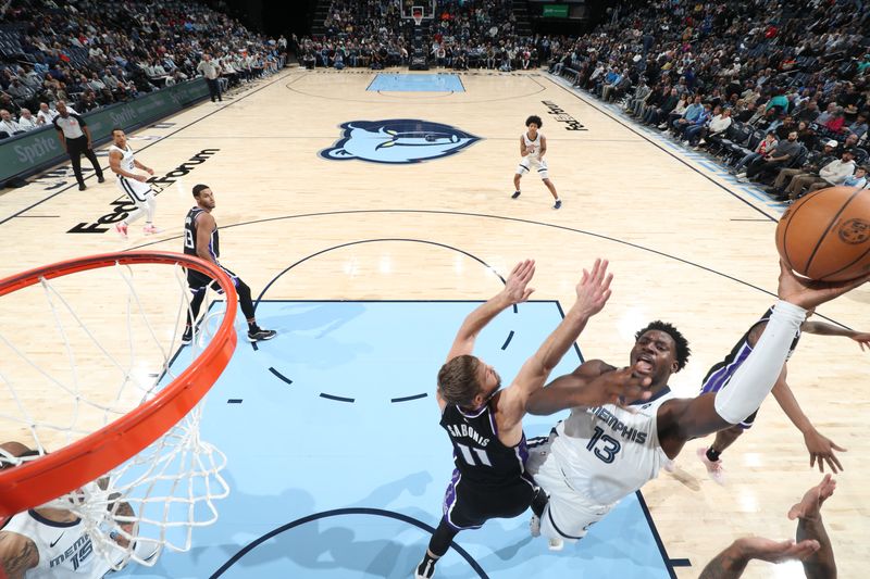 MEMPHIS, TN - DECEMBER 5: Jaren Jackson Jr. #13 of the Memphis Grizzlies drives to the basket during the game against the Sacramento Kings on December 5, 2024 at FedExForum in Memphis, Tennessee. NOTE TO USER: User expressly acknowledges and agrees that, by downloading and or using this photograph, User is consenting to the terms and conditions of the Getty Images License Agreement. Mandatory Copyright Notice: Copyright 2024 NBAE (Photo by Joe Murphy/NBAE via Getty Images)