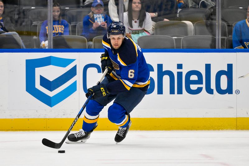 Oct 1, 2024; St. Louis, Missouri, USA;  St. Louis Blues defenseman Philip Broberg (6) controls the puck against the Columbus Blue Jackets during the first period at Enterprise Center. Mandatory Credit: Jeff Curry-Imagn Images