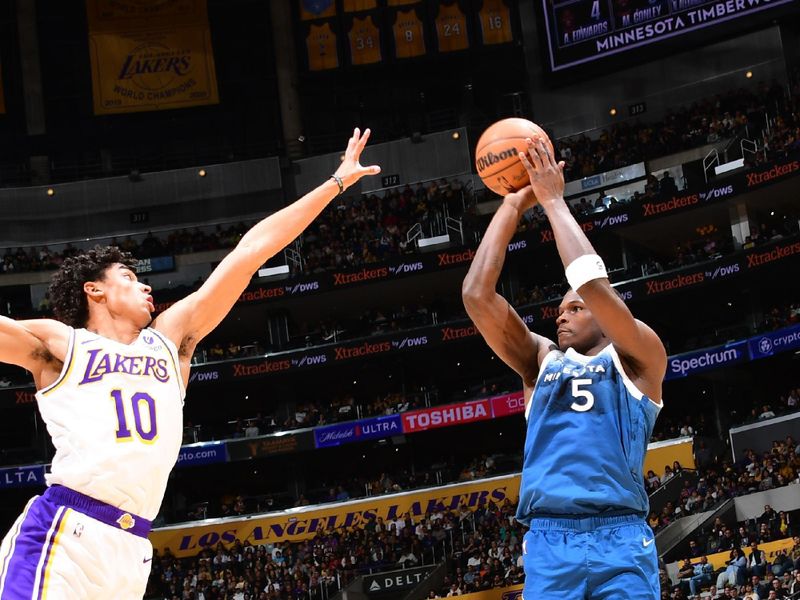 LOS ANGELES, CA - MARCH 10: Anthony Edwards #5 of the Minnesota Timberwolves shoots the ball during the game against the Los Angeles Lakers on March 10, 2024 at Crypto.Com Arena in Los Angeles, California. NOTE TO USER: User expressly acknowledges and agrees that, by downloading and/or using this Photograph, user is consenting to the terms and conditions of the Getty Images License Agreement. Mandatory Copyright Notice: Copyright 2024 NBAE (Photo by Adam Pantozzi/NBAE via Getty Images)