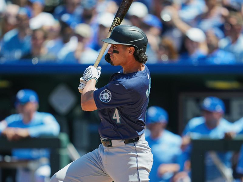 Jun 9, 2024; Kansas City, Missouri, USA; Seattle Mariners third baseman Josh Rojas (4) hits an RBI single during the seventh inning against the Kansas City Royals at Kauffman Stadium. Mandatory Credit: Jay Biggerstaff-USA TODAY Sports