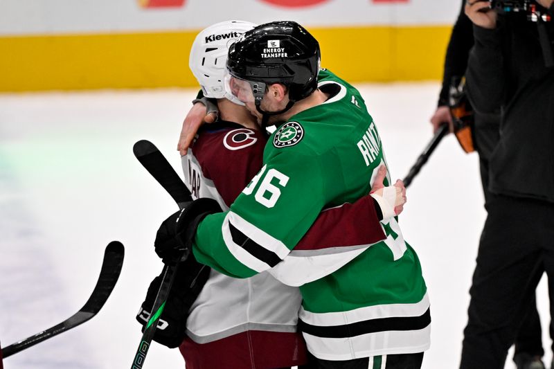 May 3, 2025; Dallas, Texas, USA; Colorado Avalanche defenseman Cale Makar (8) hugs Dallas Stars right wing Mikko Rantanen (96) after the Stars defeats the Avalanche in game seven of the first round of the 2025 Stanley Cup Playoffs at American Airlines Center. Mandatory Credit: Jerome Miron-Imagn Images