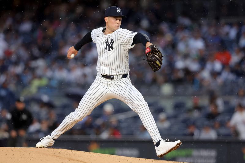 Aug 7, 2024; Bronx, New York, USA; New York Yankees starting pitcher Will Warren (98) pitches against the Los Angeles Angels during the first inning at Yankee Stadium. Mandatory Credit: Brad Penner-USA TODAY Sports