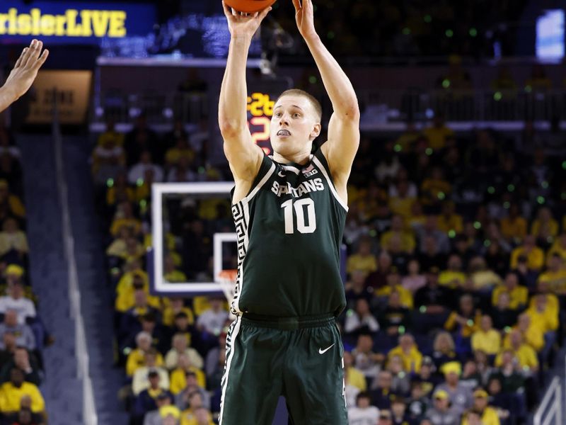 Feb 18, 2023; Ann Arbor, Michigan, USA;  Michigan State Spartans forward Joey Hauser (10) shoots the ball against the Michigan Wolverines in the second half at Crisler Center. Mandatory Credit: Rick Osentoski-USA TODAY Sports