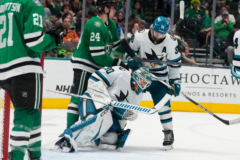 Mar 2, 2024; Dallas, Texas, USA;  San Jose Sharks goaltender Magnus Chrona (30) makes a save against the Dallas Stars during the second period at American Airlines Center. Mandatory Credit: Chris Jones-USA TODAY Sports