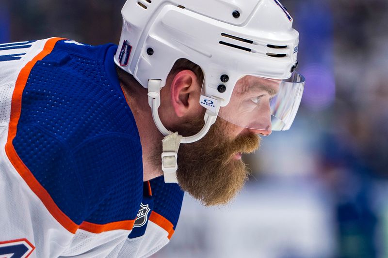 May 16, 2024; Vancouver, British Columbia, CAN; Edmonton Oilers defenseman Mattias Ekholm (14) rests in warm up prior to game five of the second round of the 2024 Stanley Cup Playoffs against the Vancouver Canucks at Rogers Arena. Mandatory Credit: Bob Frid-USA TODAY Sports