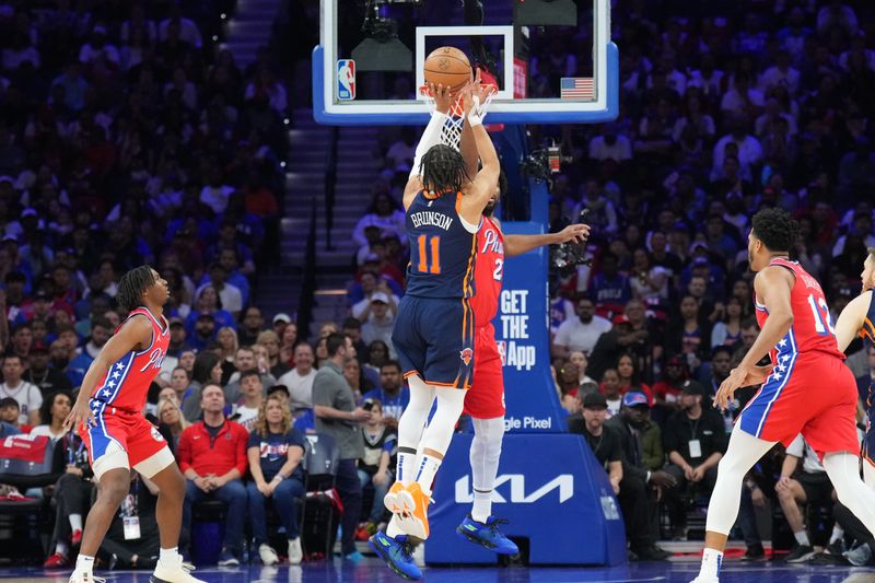 PHILADELPHIA, PA - APRIL 28: Jalen Brunson #11 of the New York Knicks shoots the ball during the game against the Philadelphia 76ers during Round 1 Game 4 of the 2024 NBA Playoffs on April 28, 2024 at the Wells Fargo Center in Philadelphia, Pennsylvania NOTE TO USER: User expressly acknowledges and agrees that, by downloading and/or using this Photograph, user is consenting to the terms and conditions of the Getty Images License Agreement. Mandatory Copyright Notice: Copyright 2024 NBAE (Photo by Jesse D. Garrabrant/NBAE via Getty Images)