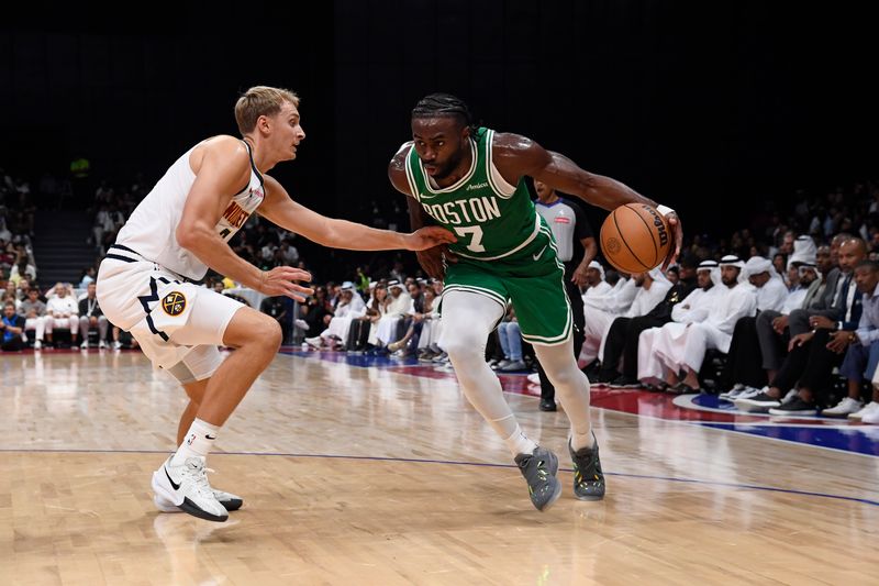 ABU DHABI, UAE - OCTOBER 6: Jaylen Brown #7 of the Boston Celtics dribbles the ball during the game against the Denver Nuggets during the 2024 Global Games on October 6, 2024 at the Etihad Arena in Abu Dhabi, United Arab Emirates. NOTE TO USER: User expressly acknowledges and agrees that, by downloading and/or using this Photograph, user is consenting to the terms and conditions of the Getty Images License Agreement. Mandatory Copyright Notice: Copyright 2024 NBAE (Photo by Brian Babineau/NBAE via Getty Images)