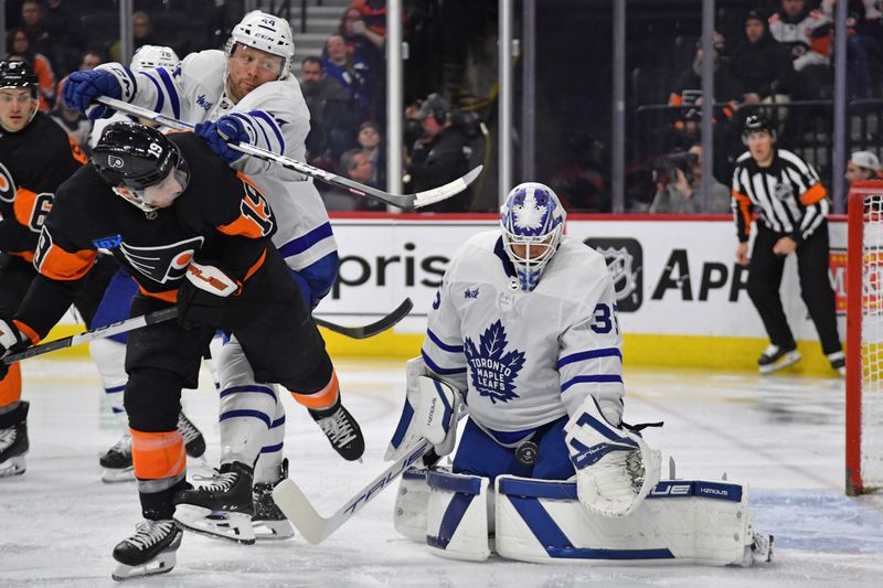 Mar 19, 2024; Philadelphia, Pennsylvania, USA; Toronto Maple Leafs goaltender Ilya Samsonov (35) makes a save against the Philadelphia Flyers during the third period at Wells Fargo Center. Mandatory Credit: Eric Hartline-USA TODAY Sports