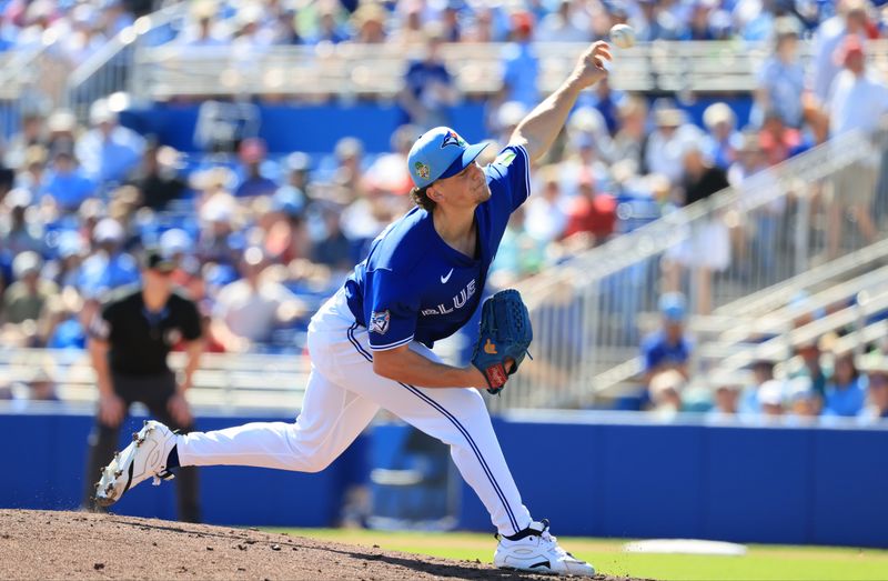 Feb 21, 2026; Dunedin, Florida, USA; Toronto Blue Jays pitcher Adam MacKo (64) throws a pitch during the third inning against the Philadelphia Phillies  at TD Ballpark. Mandatory Credit: Kim Klement Neitzel-Imagn Images