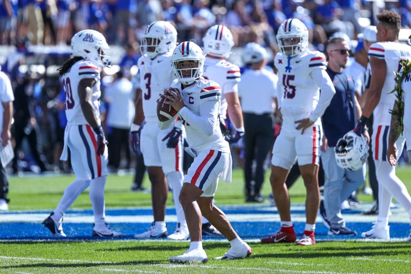 Oct 12, 2024; Provo, Utah, USA; Arizona Wildcats quarterback Noah Fifita (11) warms up before the game against the Brigham Young Cougars at LaVell Edwards Stadium. Mandatory Credit: Rob Gray-Imagn Images