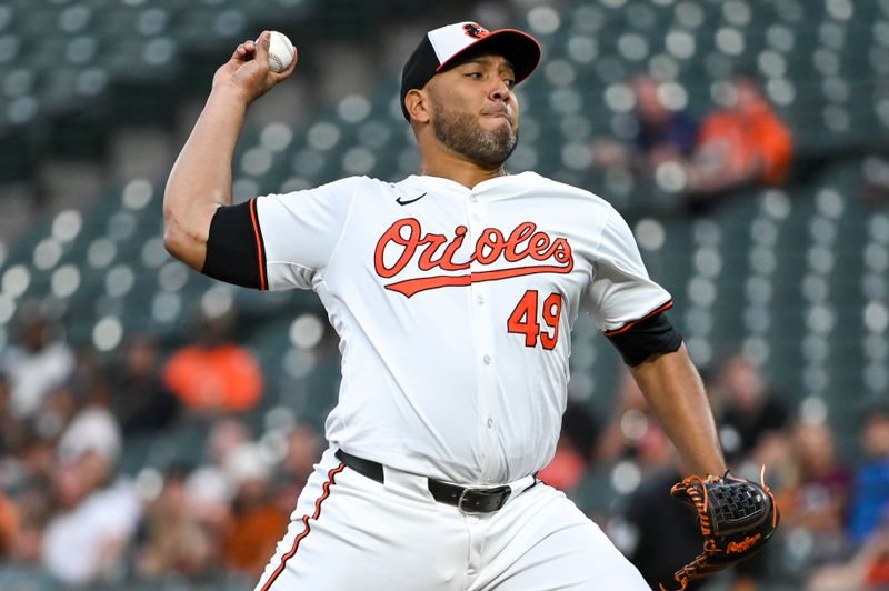 Sep 4, 2024; Baltimore, Maryland, USA;  Baltimore Orioles pitcher Albert Suárez (49) throws a third inning pitch against the Chicago White Sox at Oriole Park at Camden Yards. Mandatory Credit: Tommy Gilligan -Imagn Images