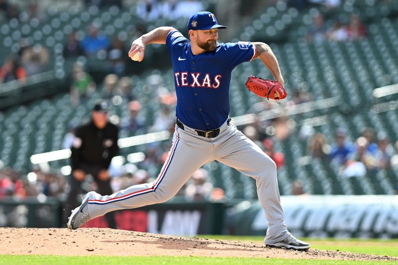 Apr 18, 2024; Detroit, Michigan, USA;  Texas Rangers pitcher Kirby Yates (39) throws a pitch against the Detroit Tigers in the eighth inning at Comerica Park. Mandatory Credit: Lon Horwedel-USA TODAY Sports