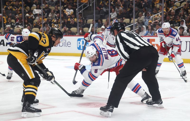 Oct 11, 2025; Pittsburgh, Pennsylvania, USA;  Pittsburgh Penguins center Sidney Crosby (87) and New York Rangers center J.T. Miller (8) take a face-off during the third period at PPG Paints Arena. Mandatory Credit: Charles LeClaire-Imagn Images