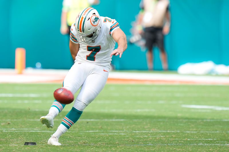 Miami Dolphins place kicker Jason Sanders (7) kicks the ball during the first half of an NFL football game against the New England Patriots, Sunday, Oct. 29, 2023, in Miami Gardens, Fla. (AP Photo/Wilfredo Lee)