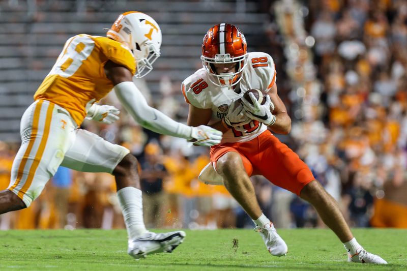 Sep 2, 2021; Knoxville, Tennessee, USA; Bowling Green Falcons wide receiver Austin Osborne (18) runs the ball against Tennessee Volunteers linebacker Solon Page III (38) during the second quarter at Neyland Stadium. Mandatory Credit: Randy Sartin-USA TODAY Sports