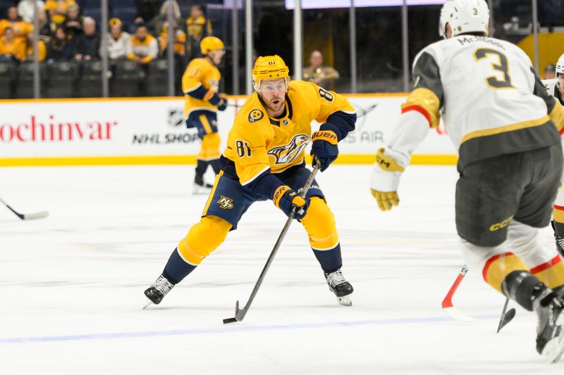 Jan 14, 2025; Nashville, Tennessee, USA;  Nashville Predators center Jonathan Marchessault (81) skates with the puck against the Vegas Golden Knights during the first period at Bridgestone Arena. Mandatory Credit: Steve Roberts-Imagn Images