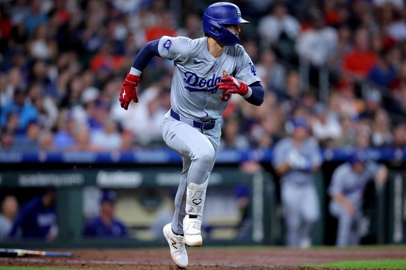 Jul 28, 2024; Houston, Texas, USA; Los Angeles Dodgers first baseman Cavan Biggio (6) runs up the base line after hitting an RBI single against the Houston Astros during the eighth inning at Minute Maid Park. Mandatory Credit: Erik Williams-USA TODAY Sports