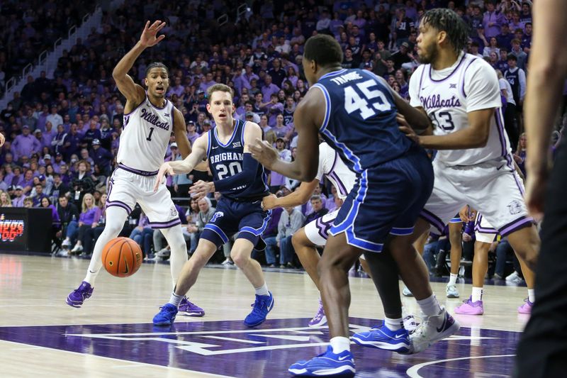 Feb 24, 2024; Manhattan, Kansas, USA; Brigham Young Cougars guard Spencer Johnson (20) passes the ball to forward Fousseyni Traore (45) during the second half against the Kansas State Wildcats at Bramlage Coliseum. Mandatory Credit: Scott Sewell-USA TODAY Sports