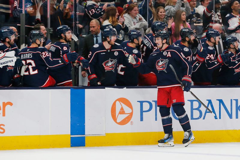 Nov 27, 2024; Columbus, Ohio, USA; Columbus Blue Jackets defenseman Zach Werenski (8) celebrates his goal against the Montreal Canadiens during the third period at Nationwide Arena. Mandatory Credit: Russell LaBounty-Imagn Images